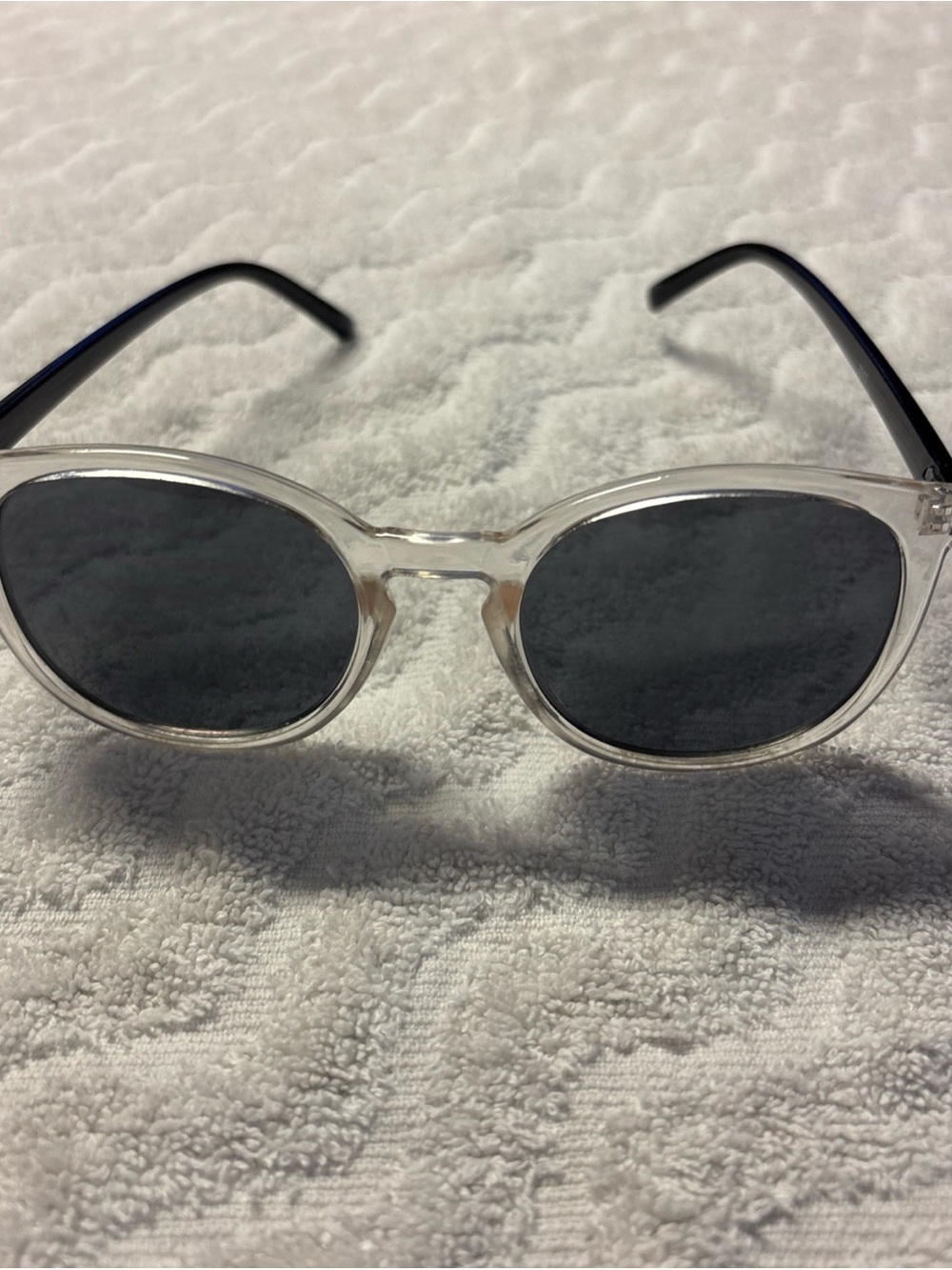 Clear Frame Oval Sunglasses with Dark Lenses